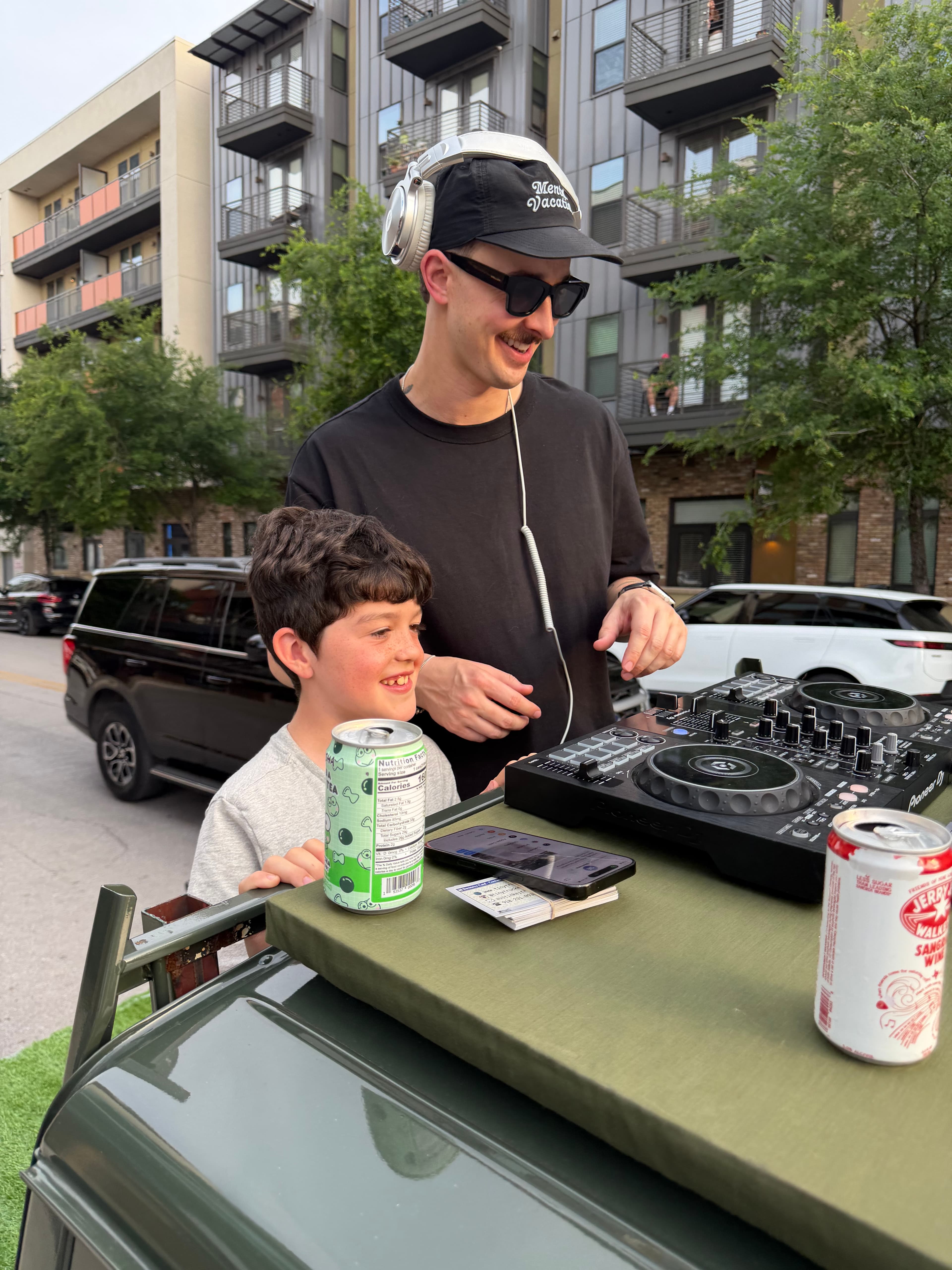 DJing at an outdoor event, Austin